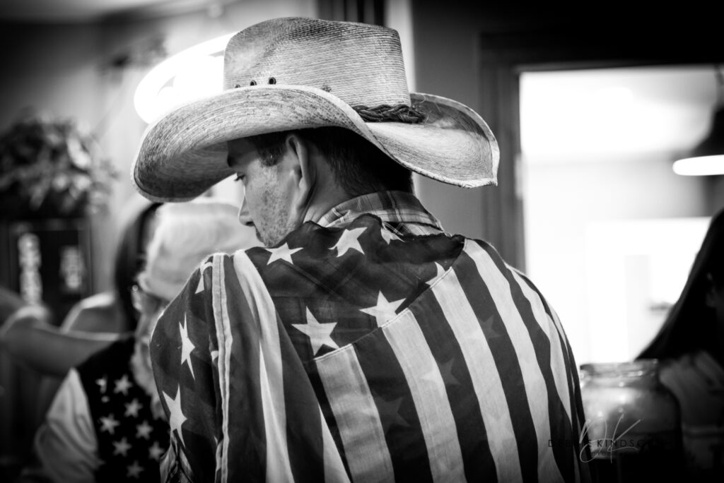 Patriotic Cowboy in American Flag black and white photo for sale